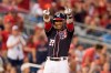 Washington Nationals Juan Soto (22) gestures after hitting a triple during the fifth inning of a baseball game against the Atlanta Braves in Washington, Friday, June 21, 2019. (AP Photo/Manuel Balce Ceneta)