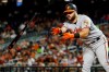 Baltimore Orioles' DJ Stewart tosses his bat after drawing a walk during the sixth inning of the team's baseball game against the Washington Nationals at Nationals Park on Wednesday, Aug. 28, 2019, in Washington. The Nationals won 8-4. (AP Photo/Alex Brandon)
