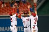 Washington Nationals' Juan Soto, left, Victor Robles, center, and Adam Eaton, right, celebrate after a baseball game against the Philadelphia Phillies, Monday, Sept. 23, 2019, in Washington. (AP Photo/Nick Wass)