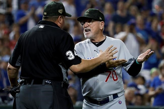 Chicago Cubs manager Joe Maddon (70) argues with umpire Sam Holbrook (34) over the delivery of Washington Nationals relief pitcher Sean Doolittle during the ninth inning of a baseball game Saturday, May 18, 2019, in Washington. Maddon thought Doolittle was using an illegal delivery. Maddon believed the left-handed Doolittle was tapping his right toe on the ground before coming to the plate. The Nationals won 5-2. (AP Photo/Andrew Harnik)
