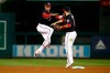 Washington Nationals left fielder Juan Soto, left, and second baseman Brian Dozier (9) celebrate after the final out against the Los Angels Dodgers in Game 4 of a baseball National League Division Series, Monday, Oct. 7, 2019, in Washington. (AP Photo/Patrick Semansky)