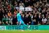 Tennis balls are thrown on to the pitch to interrupt game time in protest of Chief Executive of the Football Association of Ireland John Delaney during the UEFA Euro 2020 Qualifying, Group D match at the Aviva Stadium, in Dublin, Tuesday March 26, 2019. (Niall Carson/PA via AP)