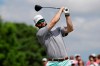 Carolina Panthers draft pick Will Grier watches his tee shot on the first hole during the pro-am of the Well Fargo Championship golf tournament at Quail Hollow Club in Charlotte, N.C., Wednesday, May 1, 2019. Grier is kicking off his NFL career with the swagger of a starting NFL quarterback. The adulation surrounding the third-pick pick has created a buzz about the Panthers' QB situation with Cam Newton coming off shoulder surgery. (AP Photo/Chuck Burton)