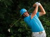 CORRECTS SPELLING TO RICKIE, INSTEAD OF RICKY - Rickie Fowler watches his tee shot on the fifth hole during the first round of the Wells Fargo Championship golf tournament at Quail Hollow Club in Charlotte, N.C., Thursday, May 3, 2012. (AP Photo/Bob Leverone)