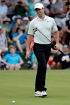 Rory McIlroy, of Northern Ireland, reacts to his putt on the second hole during the third round of the Wells Fargo Championship golf tournament at Quail Hollow Club in Charlotte, N.C., Saturday, May 4, 2019. (AP Photo/Chuck Burton)