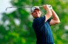 Adam Schenk watches his tee shot on the 17th hole during the first round of the Wells Fargo Championship golf tournament at Quail Hollow Club in Charlotte, N.C., Thursday, May 2, 2019. (AP Photo/Jason E. Miczek)