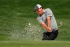 Jason Dufner hits from a sand trap on the 16th hole during the second round of the Wells Fargo Championship golf tournament at Quail Hollow Club in Charlotte, N.C., Friday, May 3, 2019. (AP Photo/Chuck Burton)