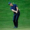 Justin Rose, of England, chips to the 15th green during the final round of the Wells Fargo Championship golf tournament at Quail Hollow Club in Charlotte, N.C., Sunday, May 5, 2019. (AP Photo/Chuck Burton)