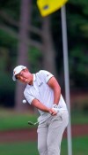 Byeong Hun An chips onto the ninth green during the second round action of the Wyndham Championship golf tournament at Sedgefield Country Club in Greensboro, N.C., Friday, Aug. 2, 2019. (H. Scott Hoffmann/News & Record via AP)