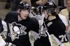 Gene J. Puskar / The Associated Press
Pittsburgh Penguins' James Neal (18) celebrates his third goal of the game with teammate Evgeni Malkin (71) during the second period of  game against the Winnipeg Jets in Pittsburgh Tuesday.