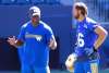 BORIS MINKEVICH / WINNIPEG FREE PRESS
Defensive backs coach Tony Missick talks to Taylor Loffler during practice Monday at Investors Group Field.