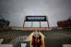 John Woods / The Canadian Press
Fans clear the stands at Investors Group Field before the storm-delayed Blue Bombers game against the Hamilton Tiger-Cats. The game began more than two hours late.