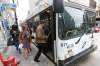 JOHN WOODS / WINNIPEG FREE PRESS FILES
Bus passengers load buses in downtown Winnipeg.