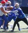 WAYNE GLOWACKI / WINNIPEG FREE PRESS
Winnipeg Blue Bombers linebacker and special teams player Kyle Knox (right) participates at practice Wednesday at Investors Group Field.