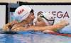 Sean Kilpatrick / The Canadian Press
Penny Oleksiak, right, and teammate Chantal Van Landeghem hug after racing the women&rsquo;s 100-metre freestyle semifinals. Their team ended up taking the bronze medal.