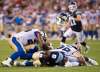 NATHAN DENETTE / THE CANADIAN PRESS
Toronto Argonauts wide receiver Kenny Shaw (8) gets his helmet knocked off on a collision by Winnipeg Blue Bombers linebacker Ian Wild (38) and Blue Bombers defensive back Kevin Fogg (23) during first half CFL football action in Toronto on Saturday, July 12, 2016. Fogg intercepted the ball on the play.