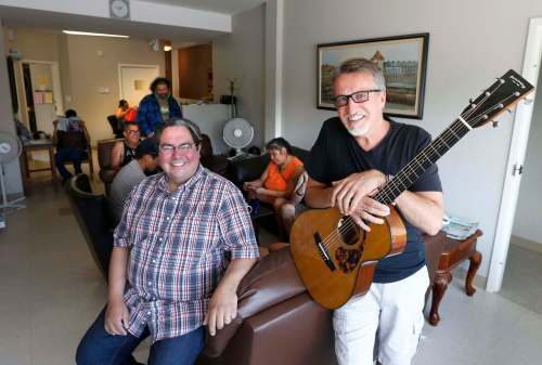 WAYNE GLOWACKI / WINNIPEG FREE PRESS
Kyle Mason (left), executive director and founder of the North End Family Centre, and Juno Award-winning musician Steve Bell have been raising funds at Manitoba churches this summer for the ministry. The non-profit relied on funds from World Vision Canada, which decided it will cut its Canadian programs Sept. 30.