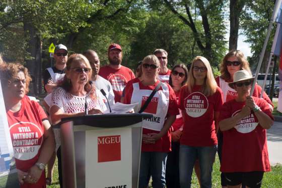 ZACHARY PRONG / WINNIPEG FREE PRESS FILESMichelle Gawronsky, second from left, the president of the Manitoba Government and General Employees Union (MGEU) surrounded by Macdonald Youth Services (MYS) Crisis Stabilization members and supporters during a rally on August 12, 2016.