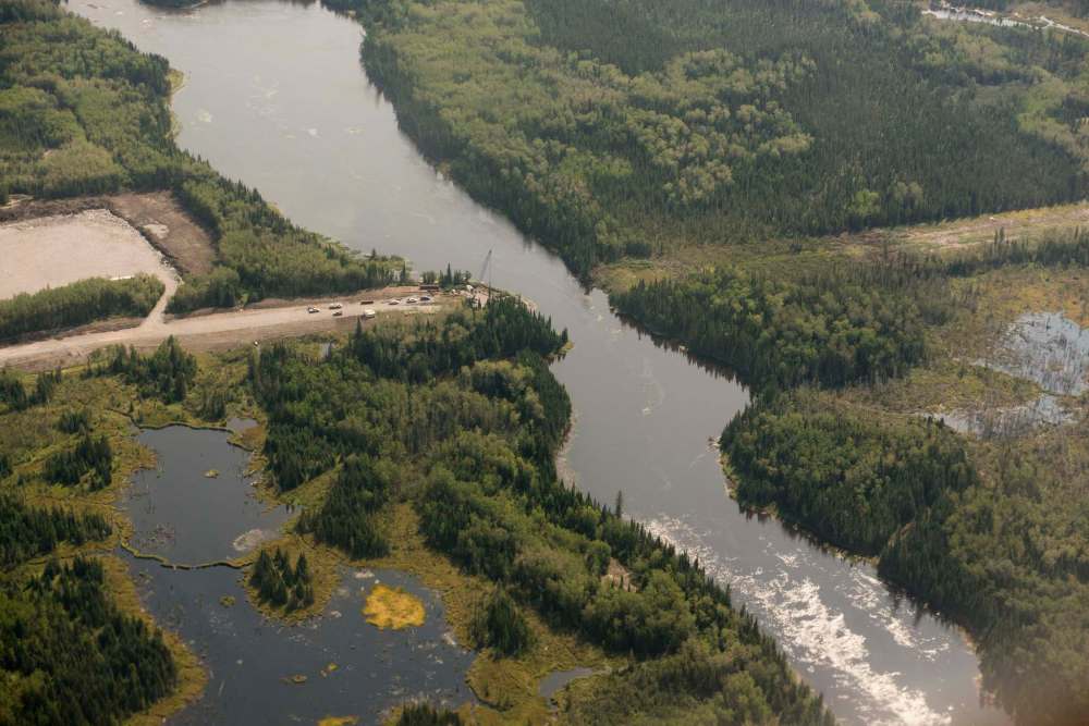 DAVID LIPNOWSKI / WINNIPEG FREE PRESS 150828 August 28, 2015 Aerial view of the future site of a bridge over Pigeon River at Berens Lake. The bridge is part of the next stage of construction of the east-side road by The Manitoba East Side Road Authority. This stage would link Berens River to Bloodvein to the south.