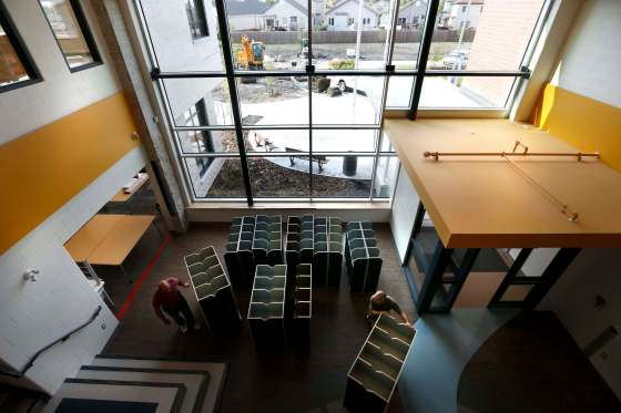 WAYNE GLOWACKI / WINNIPEG FREE PRESSThe Seven Oaks School Division is opening a new school this year called École Rivière-Rouge at 55 Swinford Way. On Friday, lockers for young students are wheeled out of the main entrance area to be installed in the school.