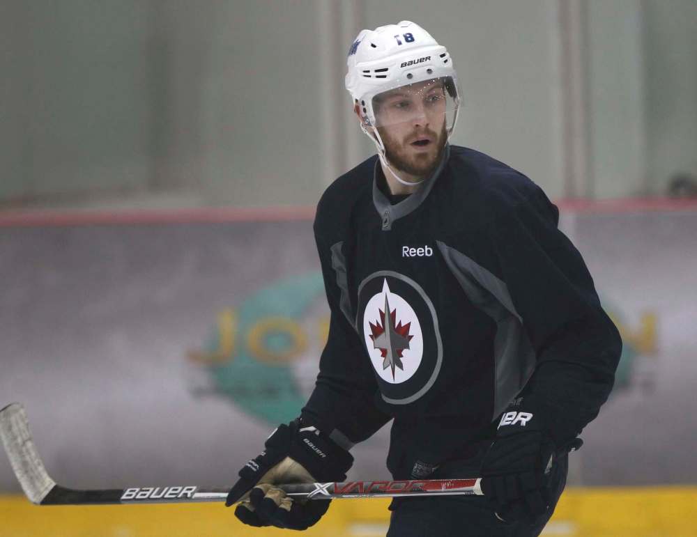 JOE BRYKSA / WINNIPEG FREE PRESS
Winnipeg Jets centre Bryan Little will miss buddy and playing partner Andrew Ladd.
