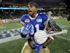 TREVOR HAGAN / FREE PRESS FILES
Maurice Leggett celebrates with the Banjo Bowl trophy after defeating the Saskatchewan Roughriders last year. The Bombers enter this year's annual contest having won five in a row, including a 28-25 triumph over Saskatchewan last weekend in Regina.