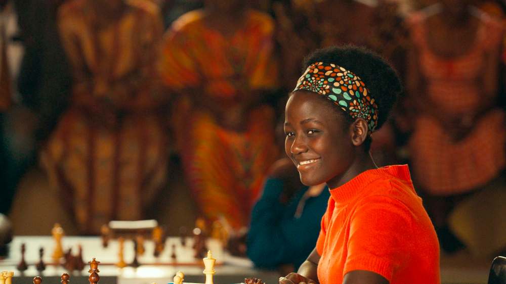 In this image released by Disney, Madina Nalwanga appears in a scene from