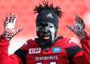 LARRY MACDOUGAL / THE CANADIAN PRESS
Stampeders' Joshua Bell shows off his face paint prior to the game against the Bombers in Calgary.