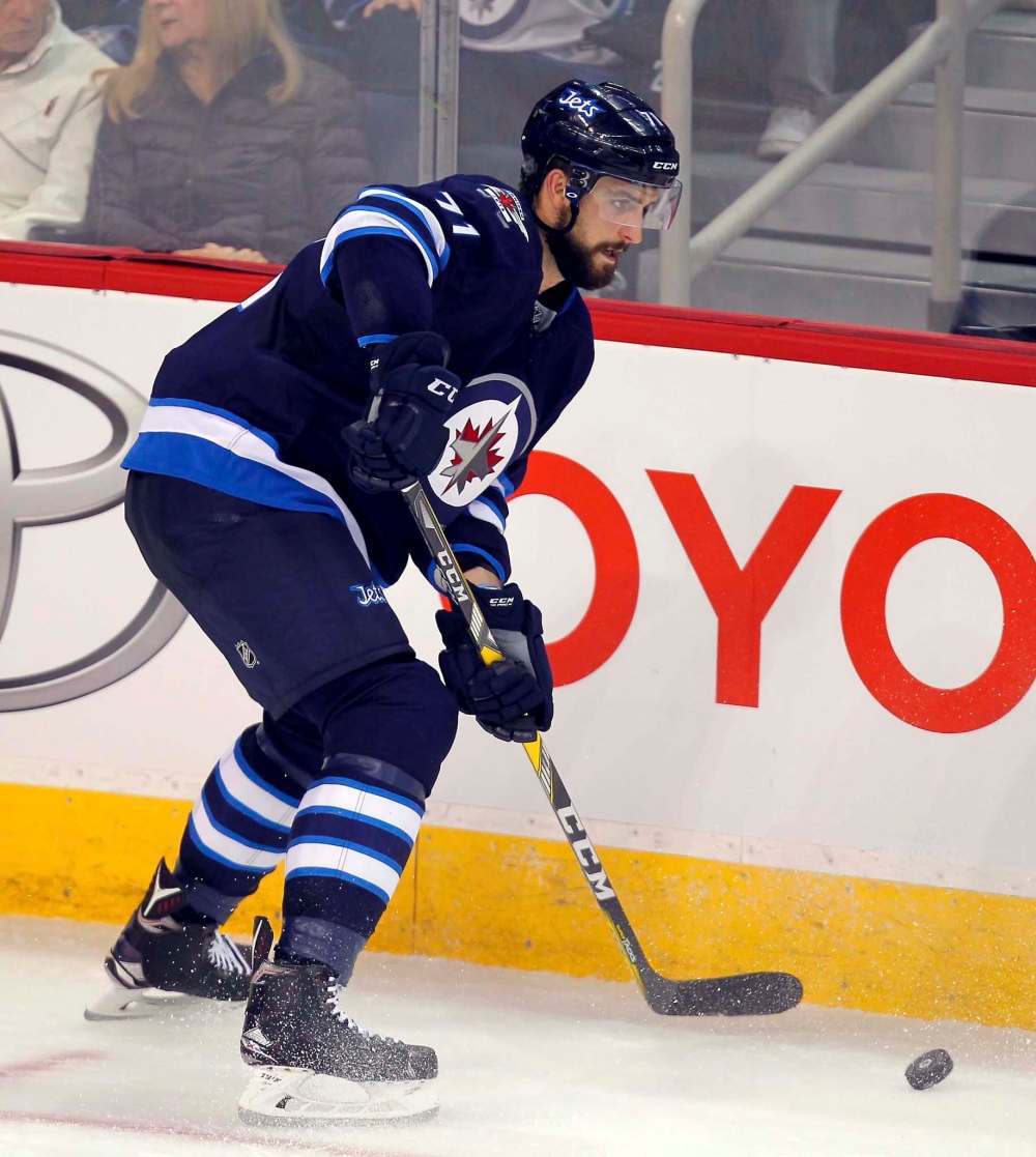 BORIS MINKEVICH / WINNIPEG FREE PRESS
Winnipeg Jets Julian Melchiori plays against the Calgary Flames Tuesday night at the MTS Centre.