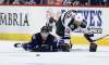 Trevor Hagan / The Canadian Press
Winnipeg Jets forward Alexander Burmistrov and Minnesota Wild counterpart Alex Tuch keep an eye on the puck after colliding during second-period pre-season NHL action Thursday in Winnipeg.