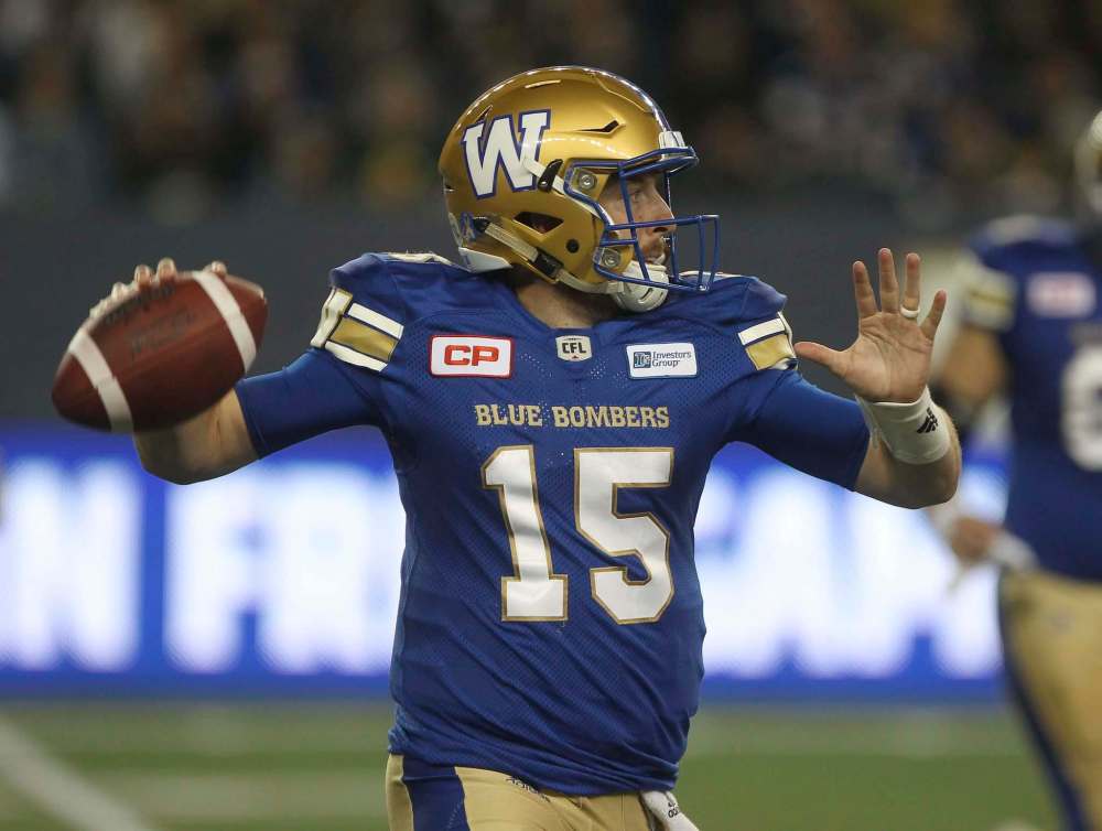 JOE BRYKSA / WINNIPEG FREE PRESS
Winnipeg Blue Bombers quarterback Matt Nichols leans back to fire a pass Friday night at Investors Group Field.