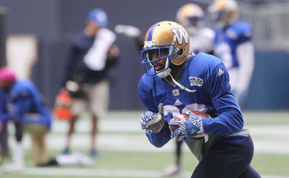 RUTH BONNEVILLE / WINNIPEG FREE PRESS
Blue Bombers defensive back Kevin Fogg practises his interception techniques Tuesday at Investors Group Field.