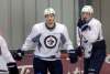 WAYNE GLOWACKI / WINNIPEG FREE PRESS
Finnish forwards Joel Armia and Patrik Laine (right) wait their turn Wednesday during the Winnipeg Jets’ practice at the MTS Iceplex. The Jets take on the Oilers in pre-season action tonight in Edmonton.