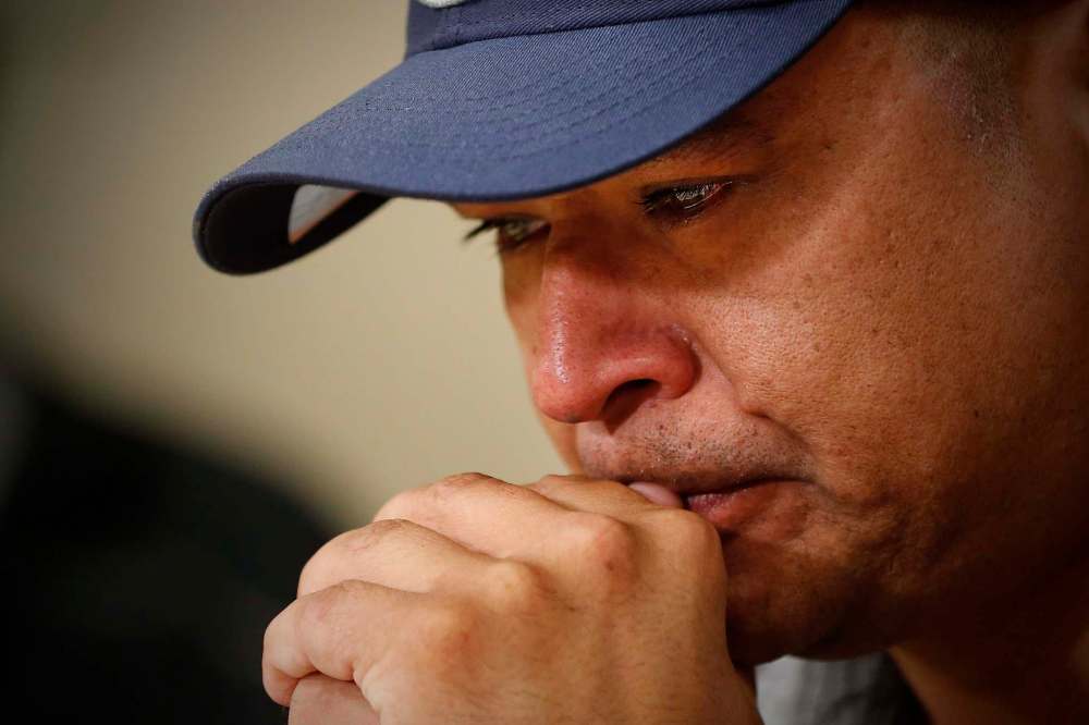 JOHN WOODS / THE CANADIAN PRESS FILES
Norway House resident Leon Swanson weeps at a press conference in Winnipeg, Friday, August 26, 2016. Swanson and David Tait Jr. were switched at birth in 1975 when their mothers gave birth at Norway House Indian Hospital. A DNA test revealed that the two men from Norway House Cree Nation in northern Manitoba were likely raised by each other's families.