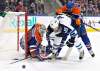 JASON FRANSON / THE CANADIAN PRESS
The Winnipeg Jets' Joel Armia is stopped by Edmonton Oilers' goalie Jonas Gustavsson as Griffin Reinhart (8) defends during first period NHL pre-season action in Edmonton.