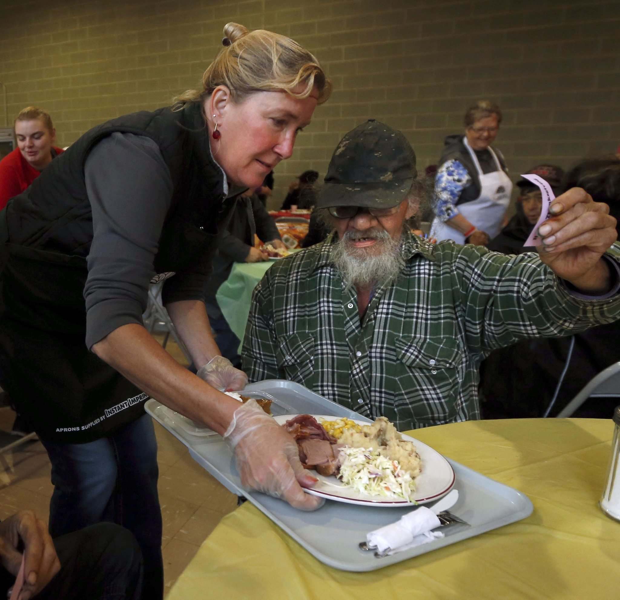 Hundreds attend Thanksgiving meal at Agape Table Winnipeg Free Press