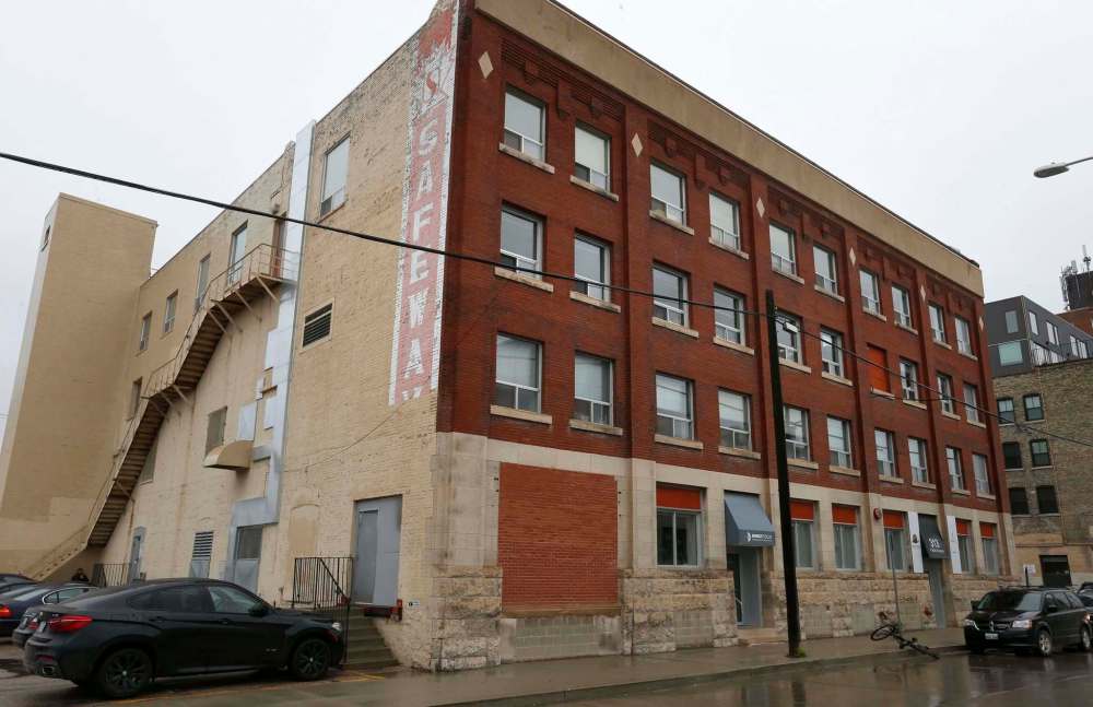 WAYNE GLOWACKI / WINNIPEG FREE PRESS 
This building at 313 Pacific Ave. became the home of Macdonalds Consolidated in 1914. When the company was sold to Safeway in 1929, the U.S. retailer established its Canadian headquarters here. ‘Safeway’ is still painted on one side of the building.