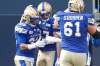 JOHN WOODS / THE CANADIAN PRESS
Winnipeg Blue Bombers' Andrew Harris (33) and Rory Kohlert (87) celebrate Harris' touchdown against the B.C. Lions during the first half of CFL action in Winnipeg.