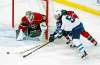 Minnesota Wild goalie Devan Dubnyk, left, defends as Zach Parise breaks up a scoring try by Winnipeg Jets’ Marko Dano, of Austria, in the first period of an NHL preseason hockey game Saturday, Oct. 8, 2016, in St. Paul, Minn. (AP Photo/Jim Mone)
