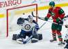 JIM MONE / AP
Minnesota Wild's Chris Stewart, right, watches as the puck sails over Winnipeg Jets goalie Michael Hutchinson into the net on a goal by Wild's Marco Scandella in the third period of an NHL preseason hockey game Saturday, Oct. 8, 2016, in St. Paul, Minn.