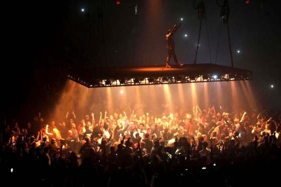 RUTH BONNEVILLE / WINNIPEG FREE PRESSKanye West performs on a stage suspended above the audience at the MTS Centre Wednesday night during the Saint Pablo Tour. It was his first visit to Winnipeg since 2008.