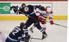 RUTH BONNEVILLE / WINNIPEG FREE PRESS
Winnipeg Jets Ben Chiarot crashes into Carolina Hurricanes Klas Dahbeck at the MTS Centre Thursday.