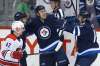 John Woods / The Canadian Press
Winnipeg Jets Toby Enstrom (left), Shawn Matthias (centre) and Drew Stafford (right) celebrate Matthias's goal Thursday at the MTS Centre.