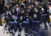 RUTH BONNEVILLE / WINNIPEG FREE PRESS
The Winnipeg Jets celebrate winning their game against the Carolina Hurricanes' 5-4 in overtime at MTS Centre.