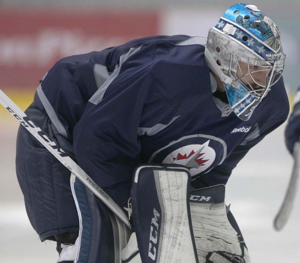 JOE BRYKSA / FREE PRESS FILES
Goaltender Michael Hutchinson will get his first start of the season tonight.