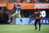 Winnipeg Blue Bombers' Kevin Fogg, left, intercepts a pass intended for B.C. Lions' Shawn Gore during the second half of a CFL football game in Vancouver, B.C., on Friday October 14, 2016. THE CANADIAN PRESS/Darryl Dyck