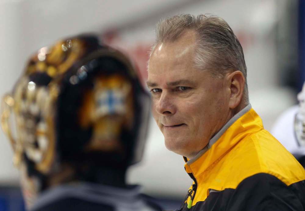 JOE BRYKSA / WINNIPEG FREE PRESS
Boston Bruins goaltender Tuukka Rask (left), has a chat with goaltender coach Bob Essensa at the MTS Centre in Winnipeg during pregame skate before tonights game against the Winnipeg Jets.