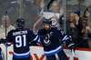 John Woods / The Canadian Press
Winnipeg Jets' Alexander Burmistrov (91) and Blake Wheeler (26) celebrate Wheeler's goal against the Boston Bruins during first period NHL action in Winnipeg on Monday, October 17, 2016.