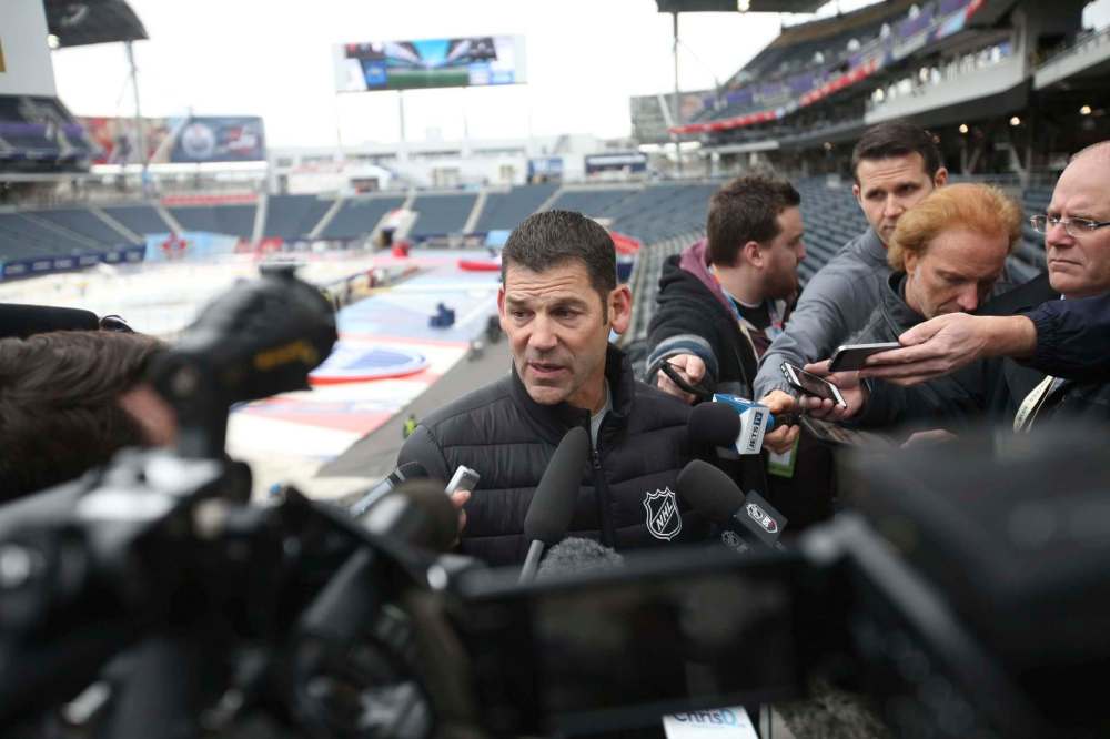 RUTH BONNEVILLE / WINNIPEG FREE PRESS
Former Winnipeg Jets player turned NHL vice-president Kris King talks up this weekend’s Heritage Classic events Thursday at Investors Group Field.