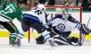 LM Otero / The Associated Press
Winnipeg Jets goalie Michael Hutchinson (34) and right wing Blake Wheeler (26) defend the goal against Dallas Stars right wing Adam Cracknell (27) in Dallas Tuesday.